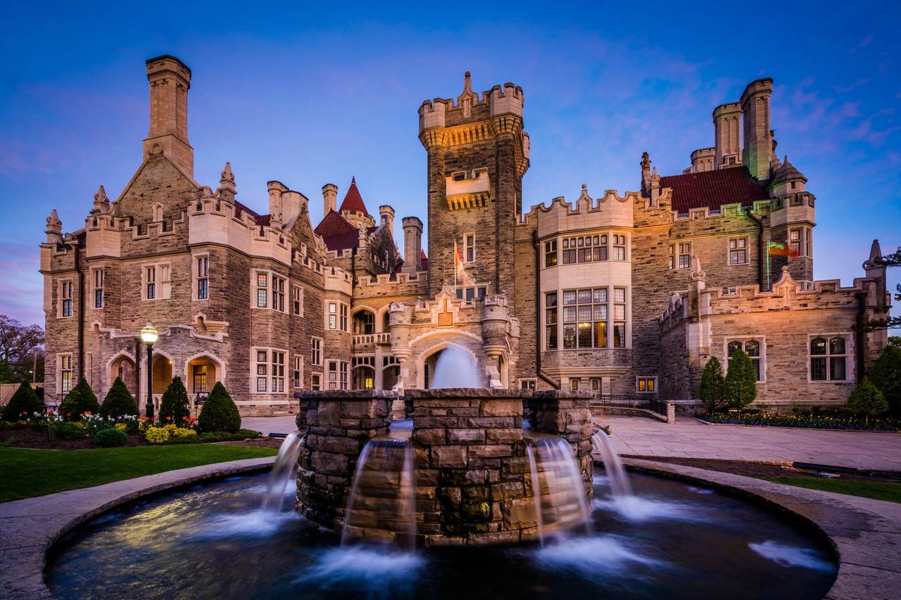 Casa Loma castle and fountain at twilight